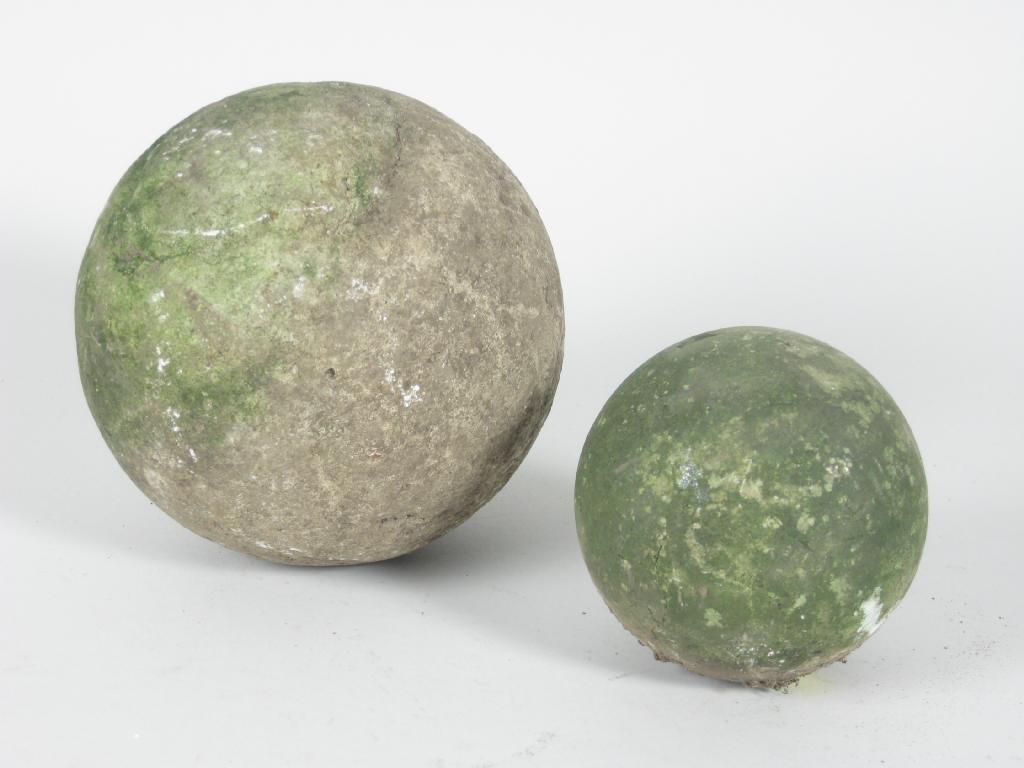 Appraisal: Two stone Cannon Balls or corn grinders square iron Weight