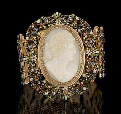 Appraisal: A Victorian Enamel Bracelet with Carved Opal Cameo Detachable Brooch