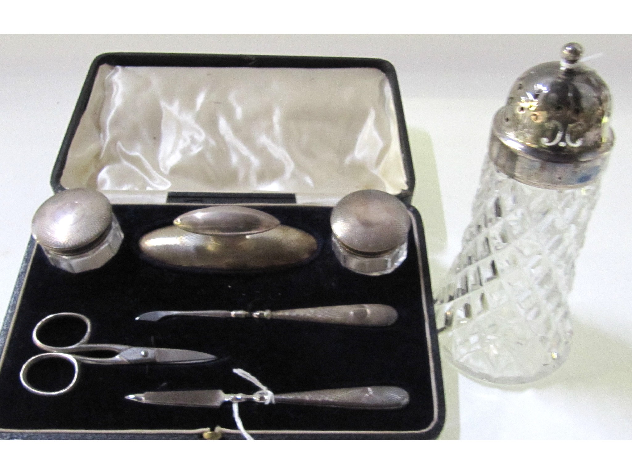 Appraisal: A lot comprising a cased silver manicure set Birmingham and