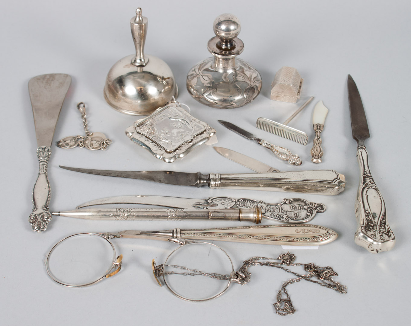 Appraisal: Group of silver handled sterling personal items comprising pieces including