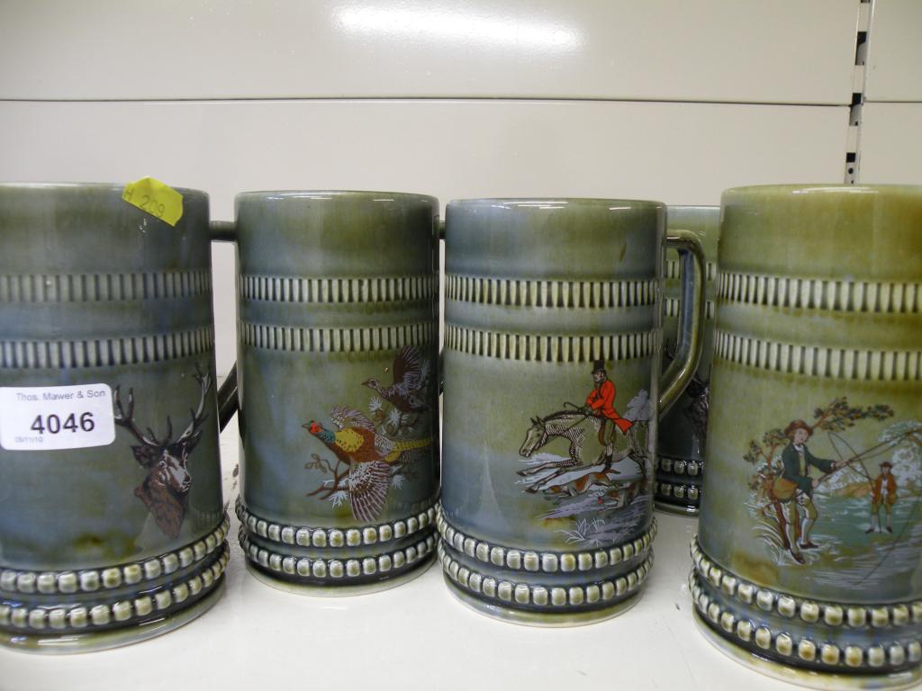 Appraisal: A set of six Irish porcelain Wade type mugs each