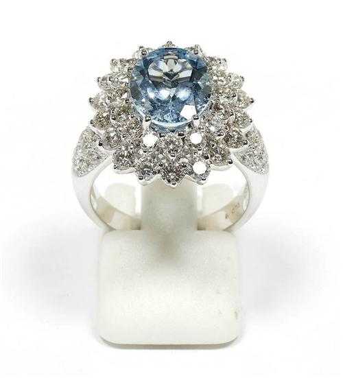 Appraisal: AQUAMARINE AND BRILLIANT-CUT DIAMOND RING White gold Elegant ring set