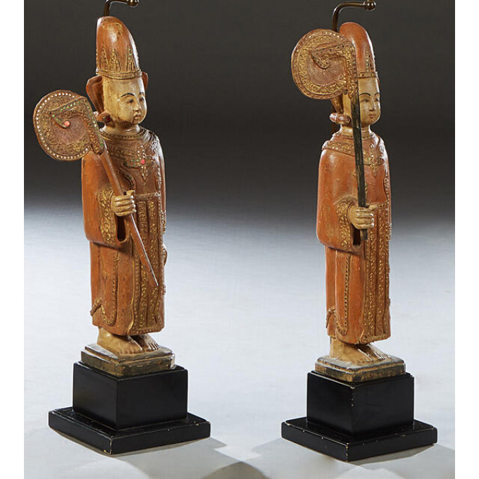 Appraisal: Pair of Large Carved Wood Indonesian Figures th c inlaid