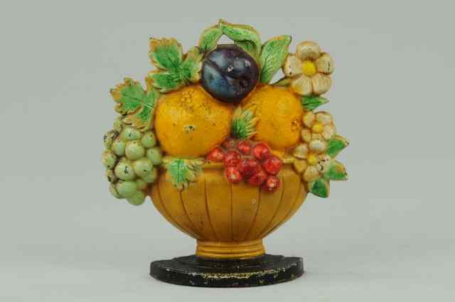 Appraisal: FRUIT BOWL DOORSTOP Hubley quaint example of mixed fruit and