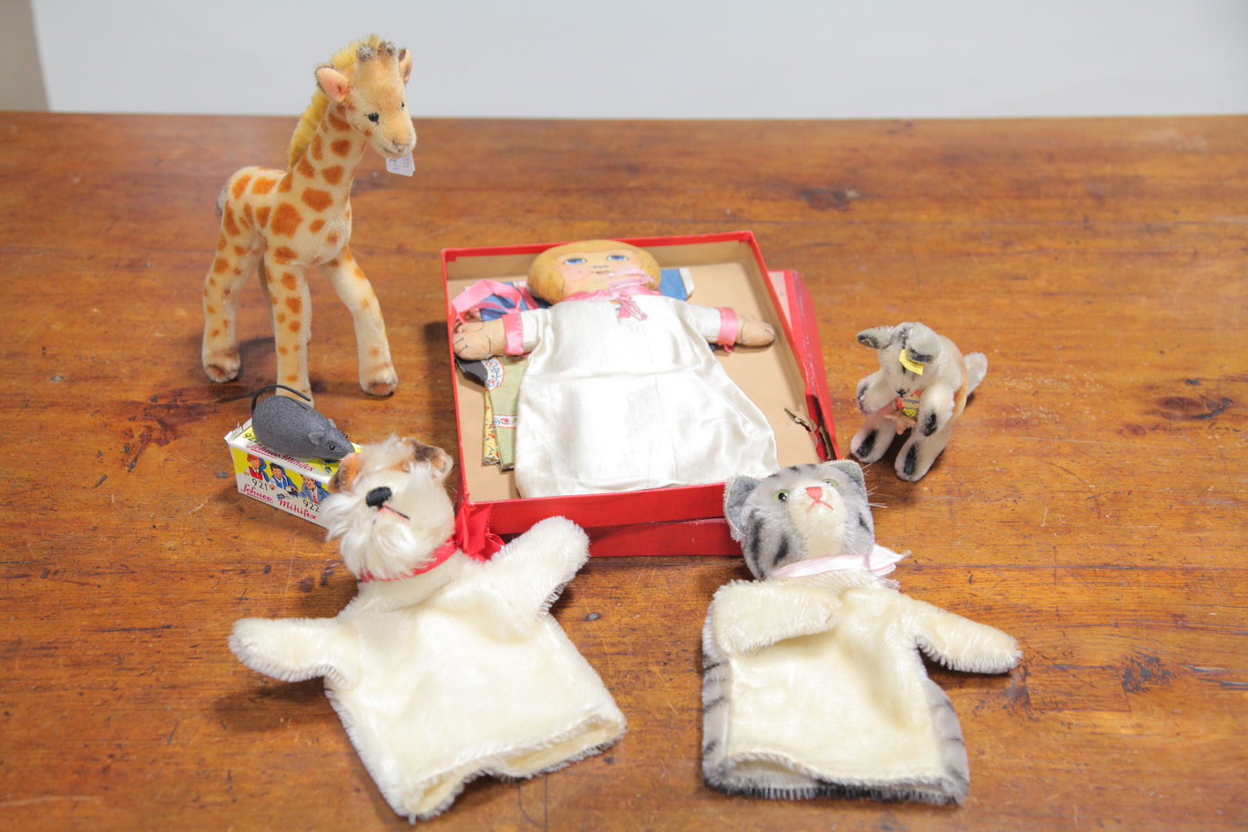 Appraisal: FIVE TOY ANIMALS AND CUDDLE DOLL German and American mid