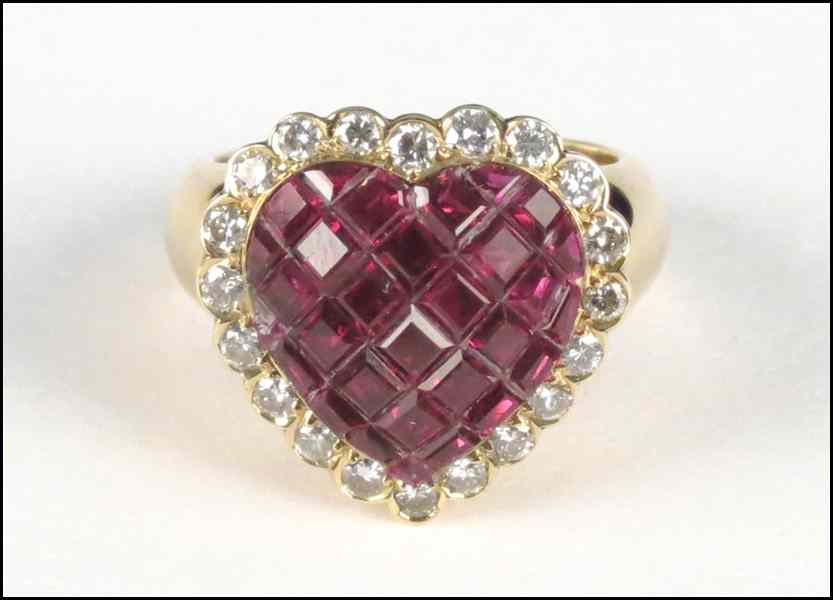 Appraisal: RUBY DIAMOND AND KARAT YELLOW GOLD HEART FORM RING grams