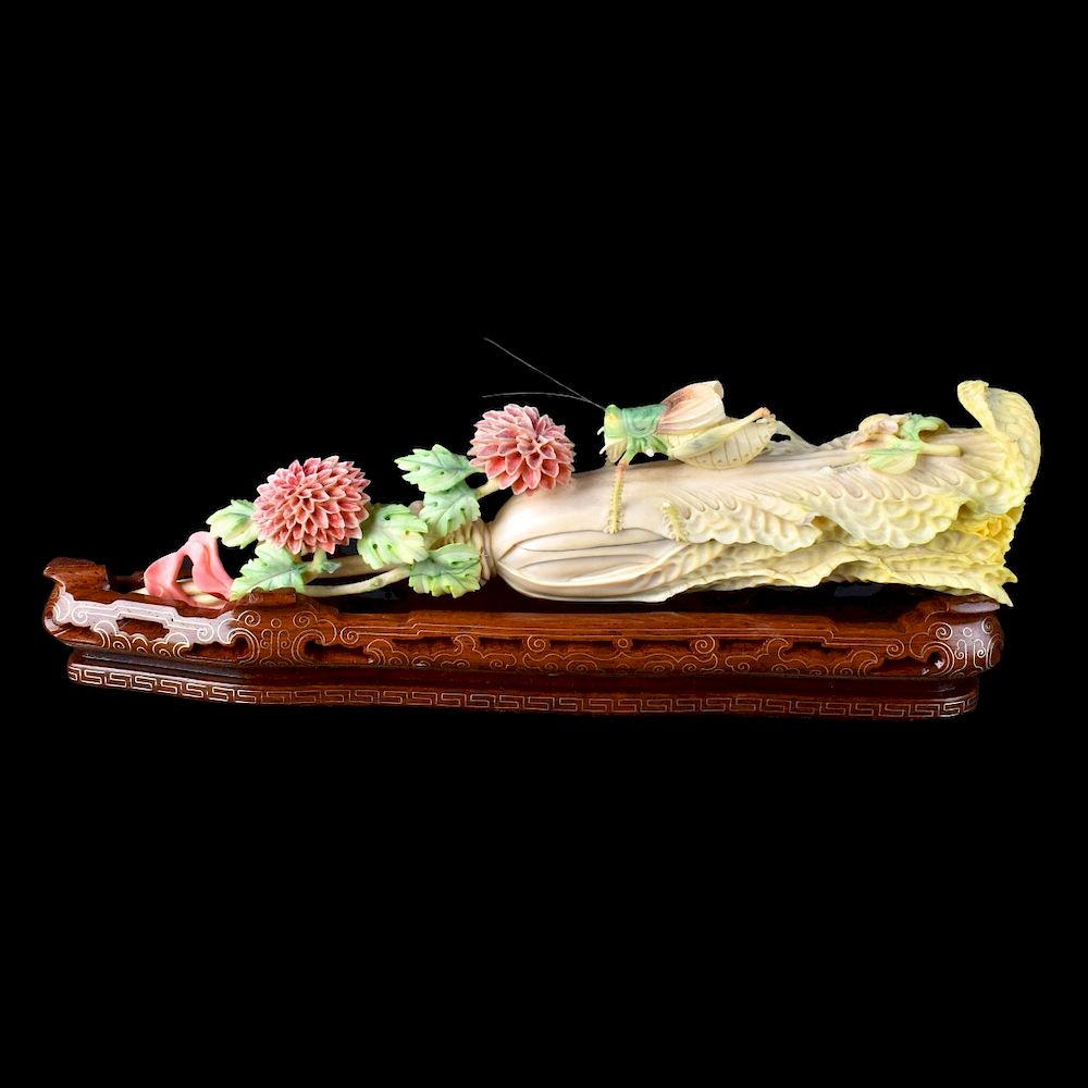 Appraisal: Chinese Carved Ivory Cabbage Chinese carved ivory vegetable Depicts a