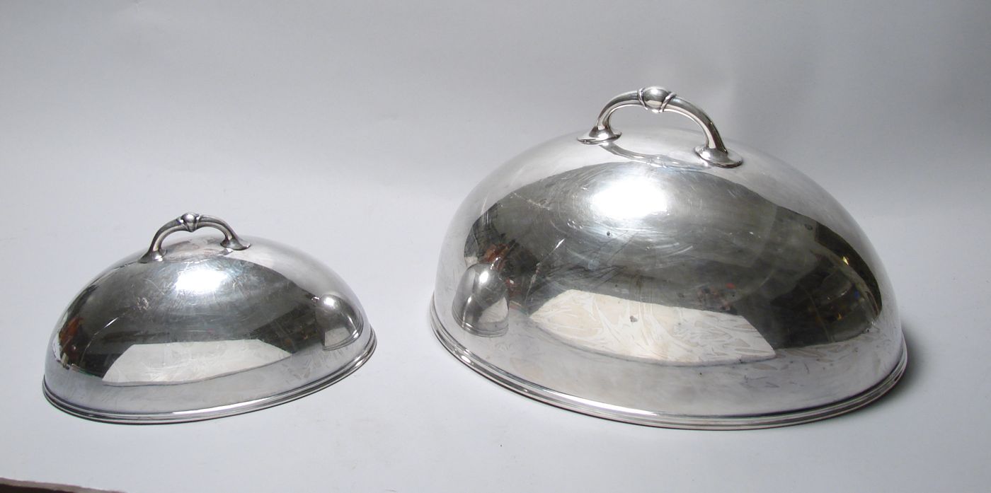 Appraisal: PAIR OF R WALLACE SILVER PLATED DOMED MEAT COVERS In