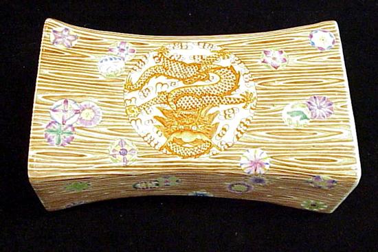 Appraisal: Chinese famille rose faux bois porcelain pillow th C pierced