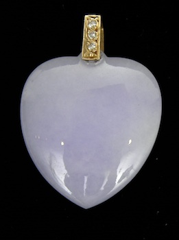 Appraisal: A Lavender Jade Pendant with Diamond Bale A well poliehsed