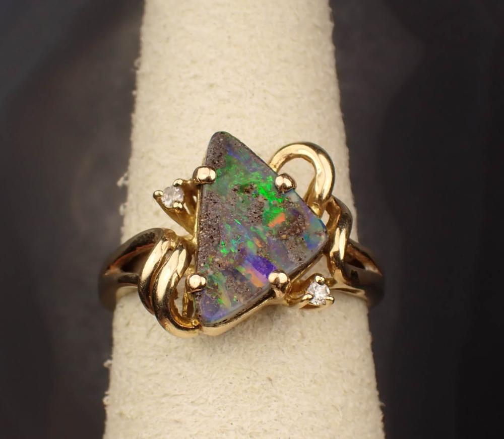 Appraisal: BOULDER OPAL DIAMOND AND FOURTEEN KARAT GOLD RING The yellow