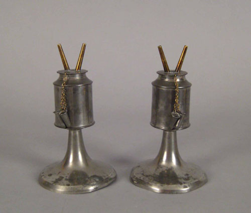 Appraisal: Pair of New England pewter whale oil lamps ca h