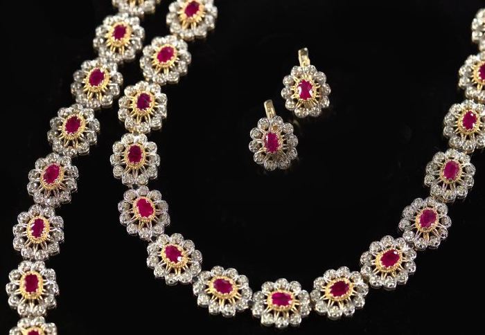 Appraisal: Four-Piece Fourteen-Karat Yellow Gold Ruby and Diamond Ensemble including a