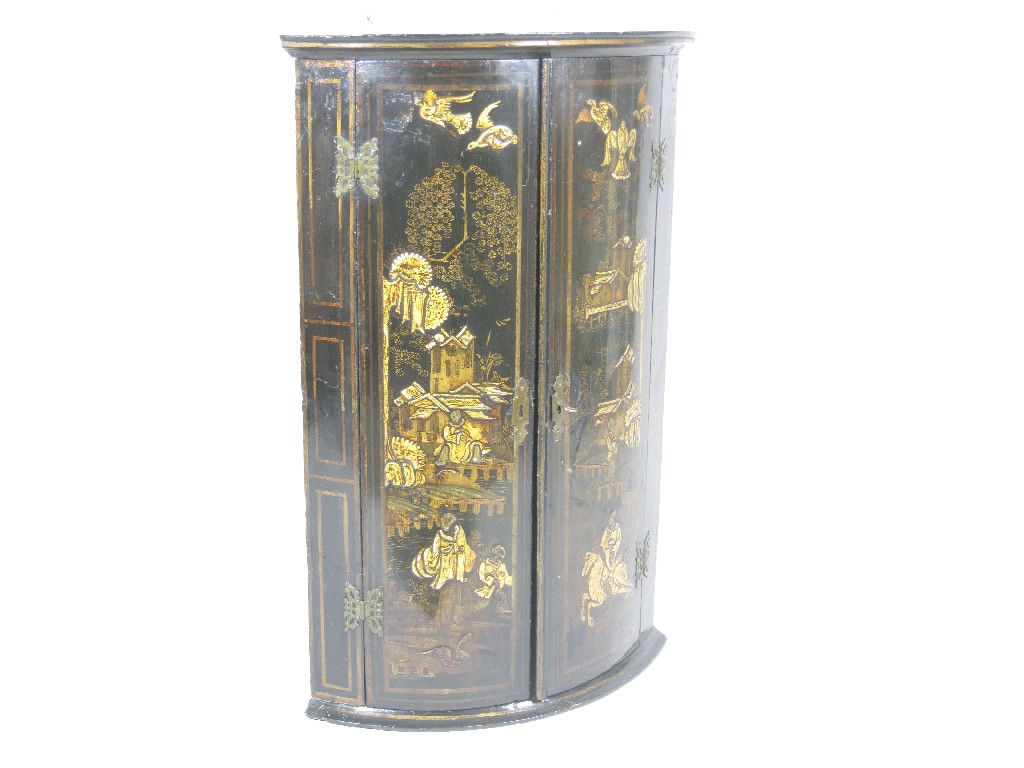 Appraisal: A Georgian lacquered bow front Hanging Corner Cupboard having pair