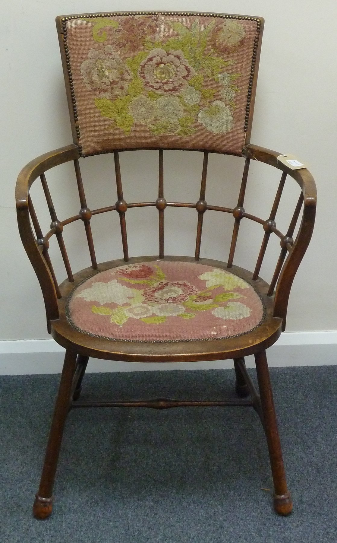 Appraisal: An Edwardian armchair with tapestry inset back rest and seat