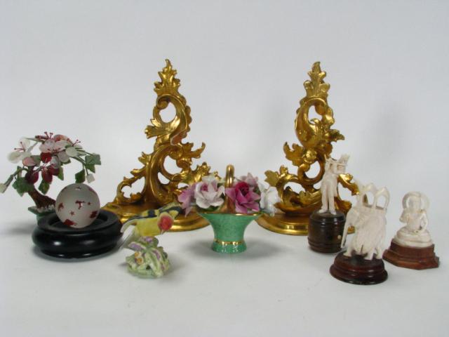 Appraisal: Group of Decorative Accessories including three carved ivory figures Royal