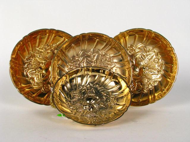 Appraisal: Four Kirk Repousse Kirk Repousse Sterling Vermeil Footed Bowls including