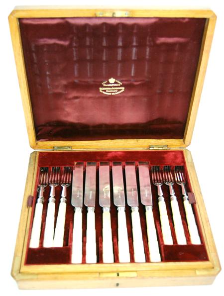 Appraisal: A cased set of twelve Victorian fruit knives and forks