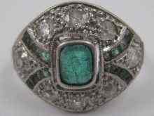 Appraisal: A French hallmarked platinum emerald and diamond ring the emerald