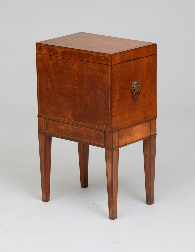 Appraisal: GEORGE III INLAID MAHOGANY CELLARETTE The hinged top inlaid with