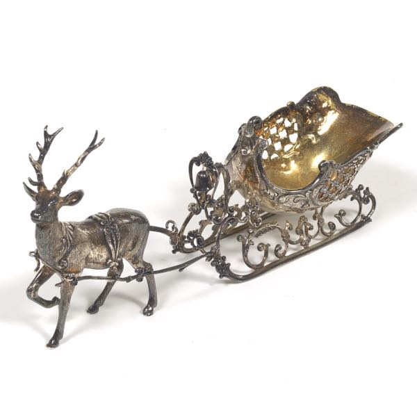 Appraisal: GERMAN STERLING SILVER REINDEER AND SLEIGH FIGURINE RETAILED BY SCULLY