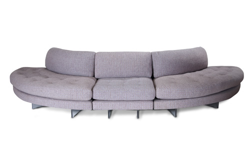 Appraisal: VLADIMIR KAGAN Crescent sofa with lavender and mauve wool on