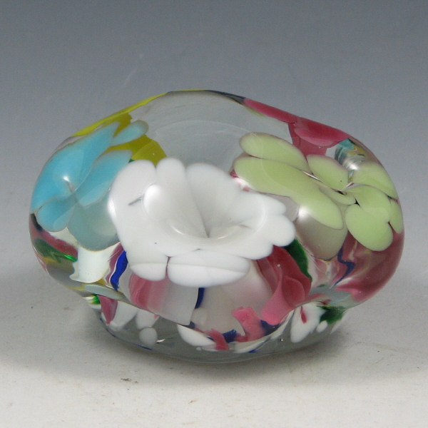 Appraisal: St Clair Multi-Colored Floriform Paperweight St Clair floriform paperweight with