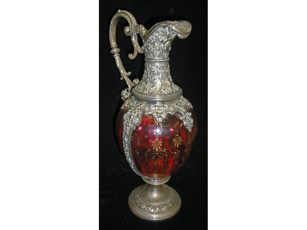 Appraisal: Continental silver plate and cranberry glass claret jug with cast