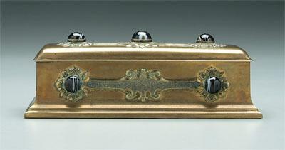 Appraisal: Jeweled brass box shaped as casket cabochon cut agates on