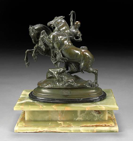 Appraisal: A French patinated bronze equestrian group Horse Tamer cast after