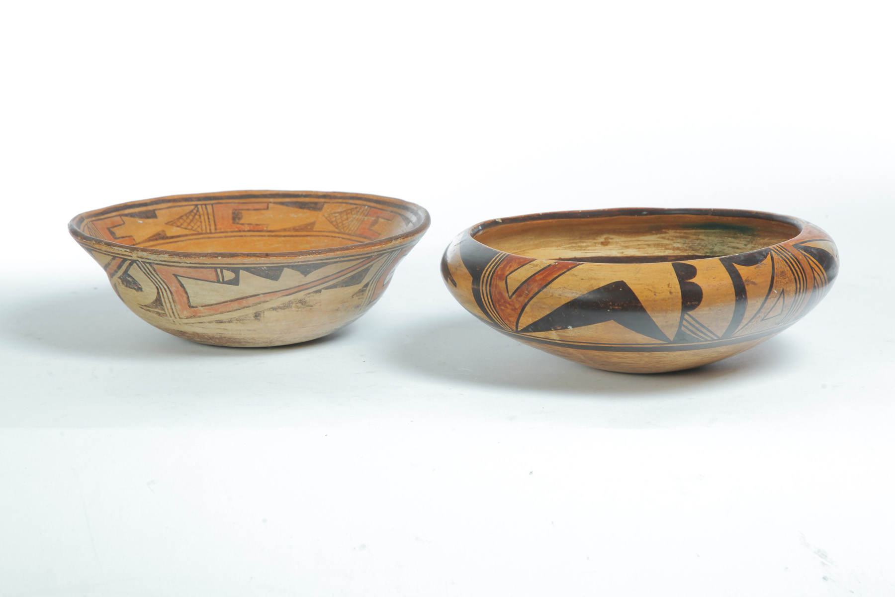 Appraisal: TWO HOPI POTTERY BOWLS First half- th century Polychrome slip