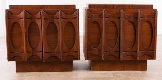 Appraisal: Mid-Century modern pair of Brasilia-style cabinet nightstands resting on a