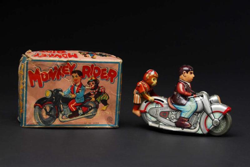 Appraisal: Tin Monkey Rider Motorcycle Wind-Up Toy Description Japanese Working When