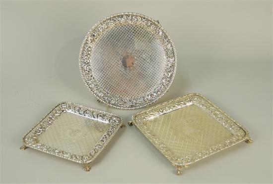 Appraisal: THREE AMERICAN SILVER REPOUSSE FOOTED TRAYS various makers including Circular