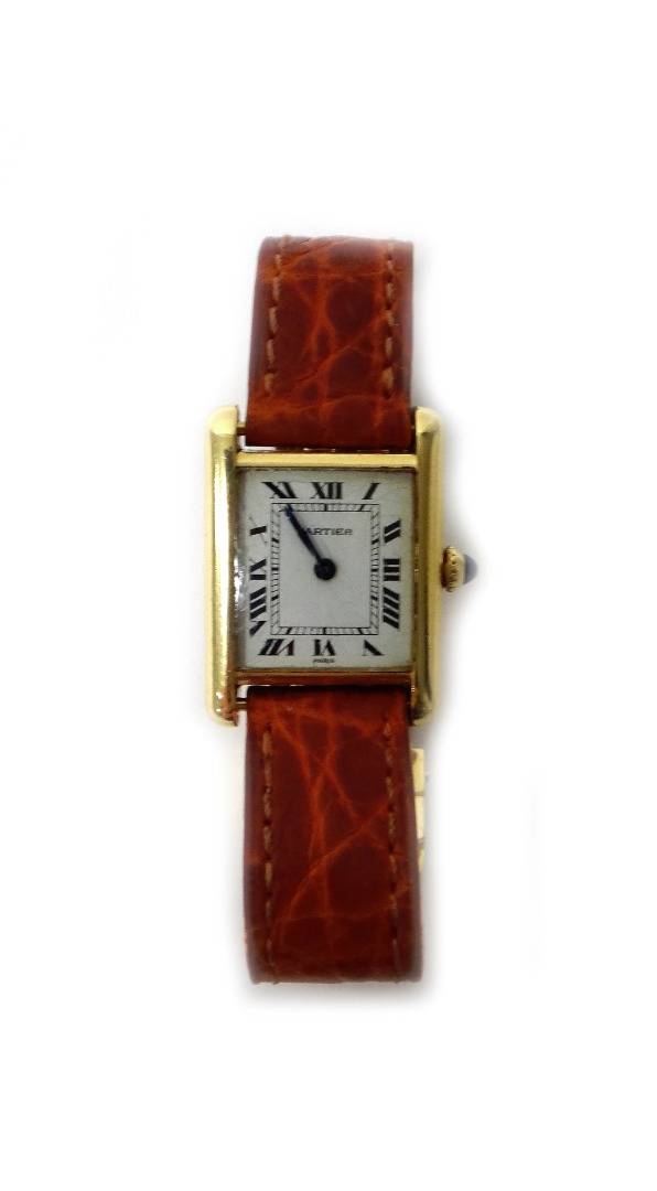 Appraisal: A Cartier lady's rectangular cased Tank wristwatch the signed cream