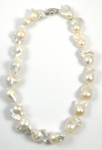 Appraisal: FRESHWATER BAROQUE PEARL NECKLACE strung with white baroque pearls coming