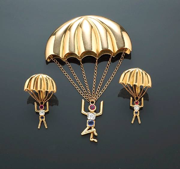 Appraisal: A diamond gem-set and fourteen karat gold parachute motif jewelry