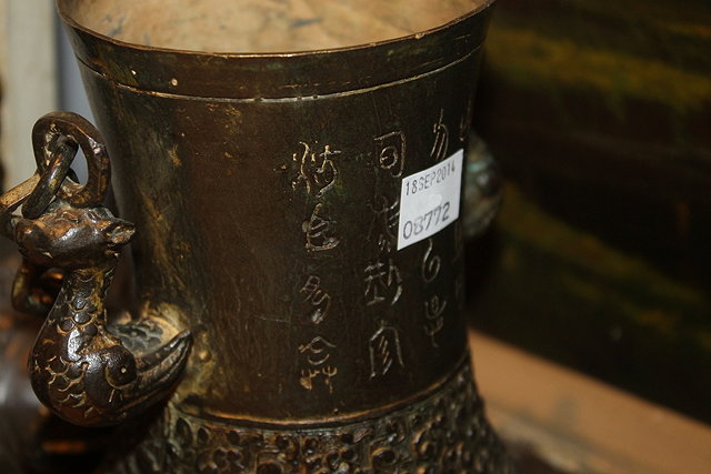 Appraisal: A CHINESE BRONZE ARCHAIC STYLE VASE and cover after The