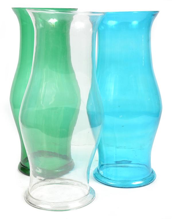 Appraisal: A COLLECTION OF THREE COLOURED AND CLEAR GLASS STORM SHADES