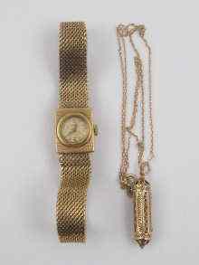 Appraisal: A ct gold Longines lady's wrist watch on Milanese bracelet