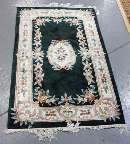 Appraisal: Contemporary Handmade Chinese Sculpted ScatterCarpet Floral pattern with dark green