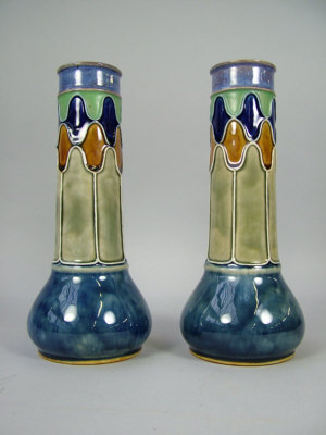 Appraisal: A pair of Royal Doulton bulbous vases with raised necks