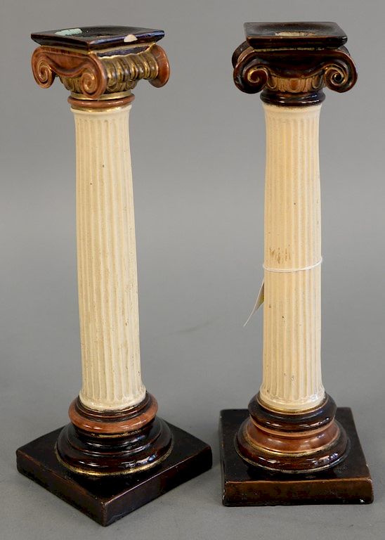 Appraisal: Pair of majolica vitruvian column form candlesticks impressed model number