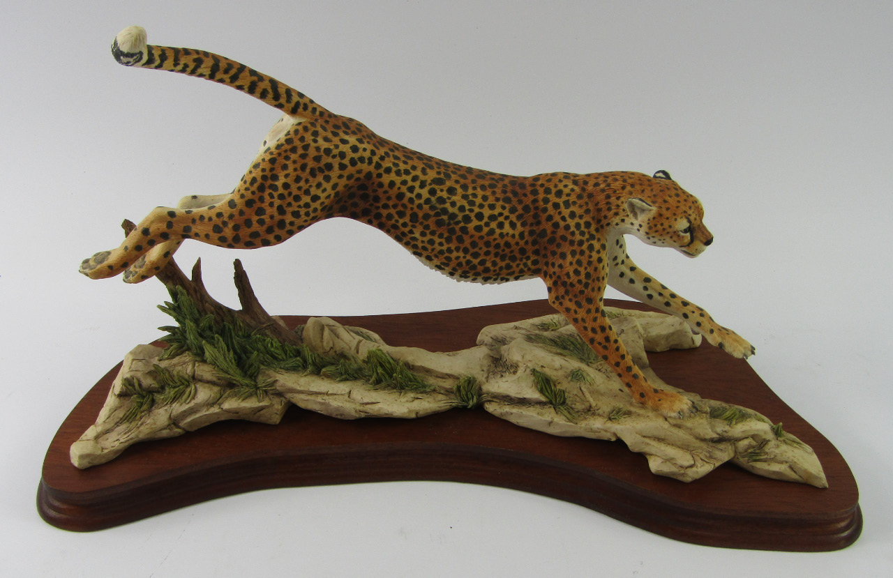 Appraisal: A Border Fine Arts figure male cheetah on naturalistic setting