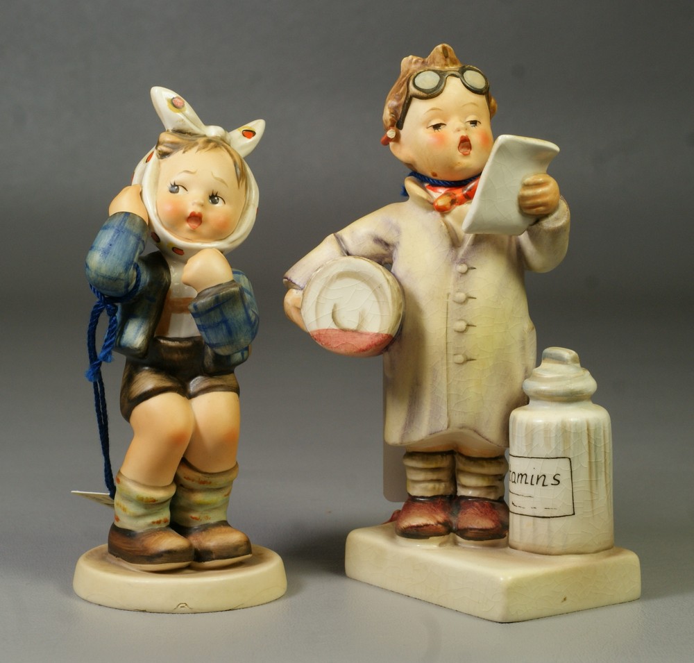 Appraisal: Goebel Hummel Figurines Little Pharmacist crazing No TMK- Boy with