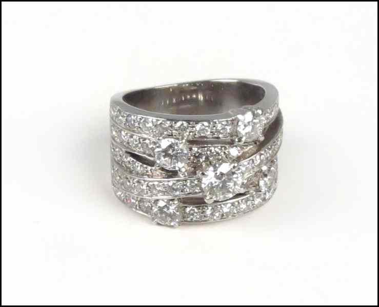 Appraisal: DIAMOND AND PLATINUM RING Round brilliant diamonds total approximately carats