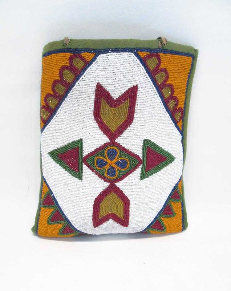 Appraisal: NATIVE AMERICAN PLATEAU BEADED BAG hand sewn and decorated with