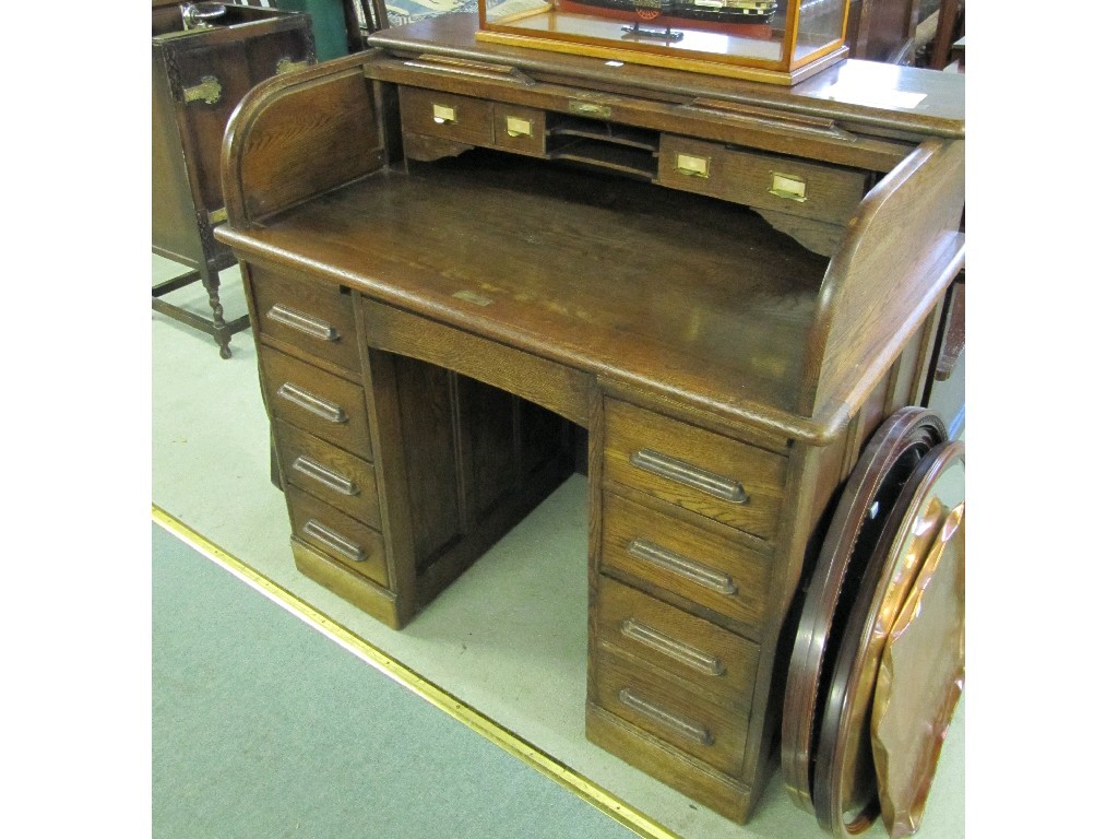 Appraisal: Victorian oak twin pedestal roll top desk