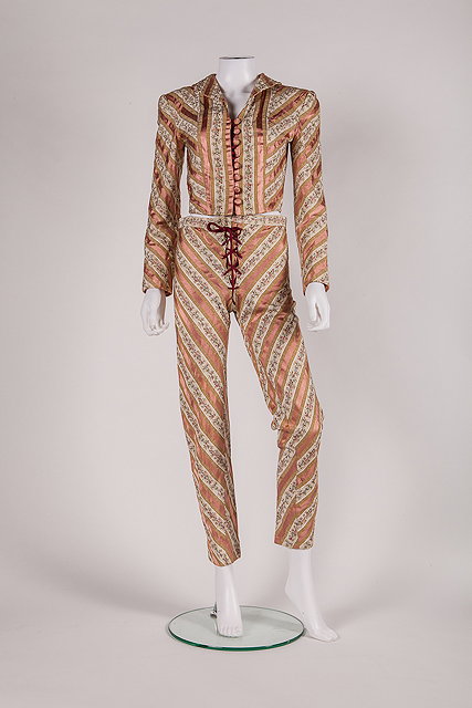 Appraisal: A two piece floral trouser suit pink silk gold and