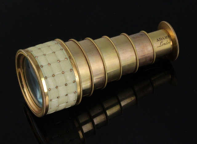 Appraisal: A gilt metal and ivory opera telescope by Adams London